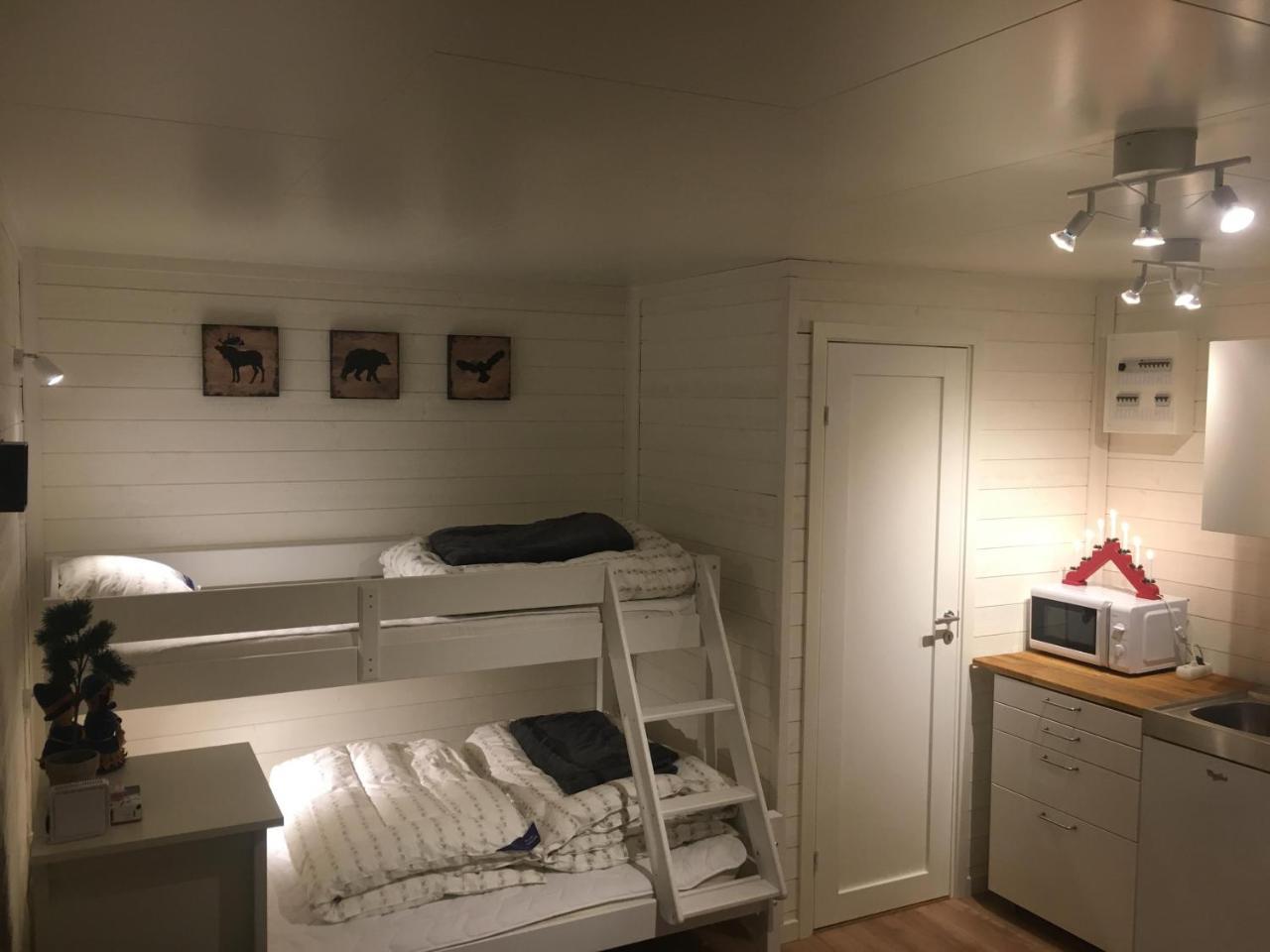 Camp Caroli Wooden Cabins Jukkasjärvi Kültér fotó